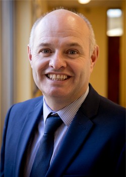 Adrian Delaney – Principal